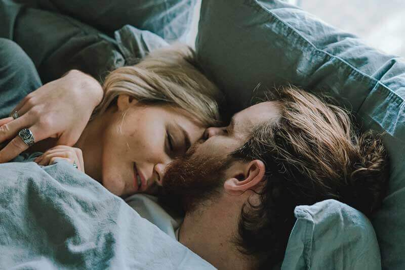 Man and woman with sleep apnea sleeping peacefully